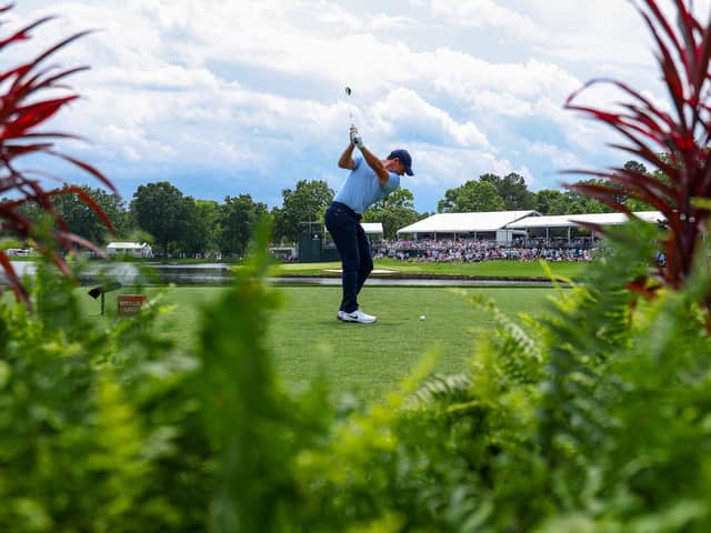Northern Ireland's Rory McIlroy hits a tee shot on the 17th hole during his second round of the Wells Fargo Championship at Quail Hollow Country Club. (Photo by Andrew Redington/Getty Images)