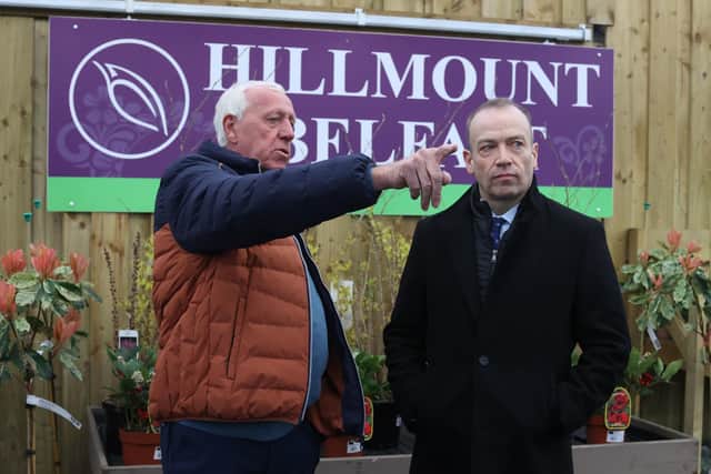 Northern Ireland Secretary Chris Heaton-Harris (right) with Robin Mercer, director of the Hillmount Garden Centre, during a visit to the centre on the Upper Braniel Road in Belfast