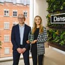Ciara is pictured receiving her award in the boardroom from Danske Bank’s Deputy CEO and chief financial officer, Stephen Matchett
