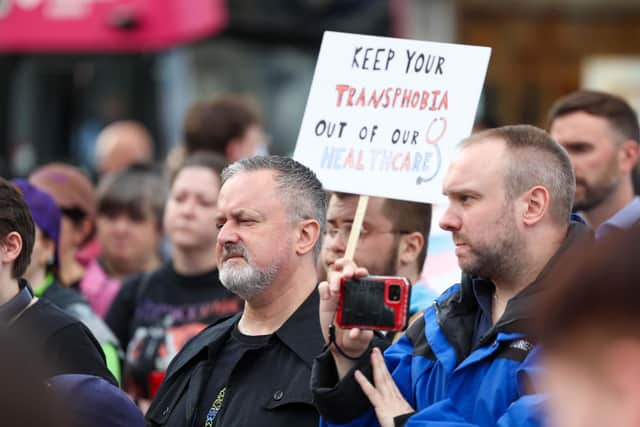 Protesters at Belfast City Hall oppose a temporary ban on the sale or supply of puberty blockers. Picture: Presseye.com