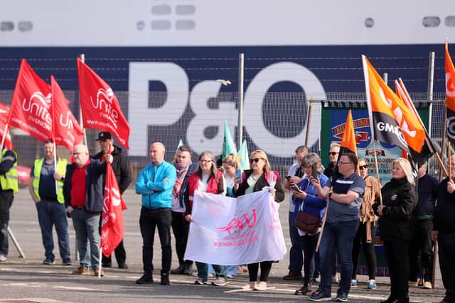 Former P&O workers protest with union colleagues at the Port of Larne after the ferry company laid off 800 workers across the UK last year.