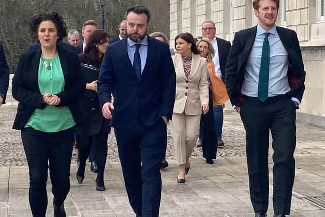 SDLP leader Colum Eastwood (centre), with South Belfast MP Claire Hanna (left) and Opposition leader Matthew O'Toole lead their MLAs into Stormont ahead of the first official Opposition day, following the decision by the SDLP to go into Opposition. Photo: Rebecca Black/PA Wire