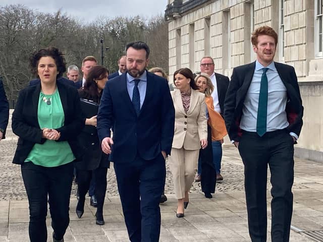 SDLP leader Colum Eastwood (centre), with South Belfast MP Claire Hanna (left) and Opposition leader Matthew O'Toole lead their MLAs into Stormont ahead of the first official Opposition day, following the decision by the SDLP to go into Opposition. Photo: Rebecca Black/PA Wire