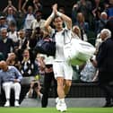 Scotland's Andy Murray acknowledges the crowd after his match is suspended against Stefanos Tsitsipas at Wimbledon