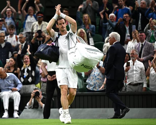 Scotland's Andy Murray acknowledges the crowd after his match is suspended against Stefanos Tsitsipas at Wimbledon
