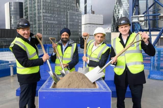 Real estate developer, owner and operator Dominus, in partnership with Cookstown-based design and build contractor McAleer & Rushe, has reached a significant construction milestone with the topping out of a landmark scheme in the City of London. Pictured is Eamonn Laverty, Sukhpal Ahluwalia, Preet Ahluwalia and Mark Diamond (Image credit: McAleer & Rushe)