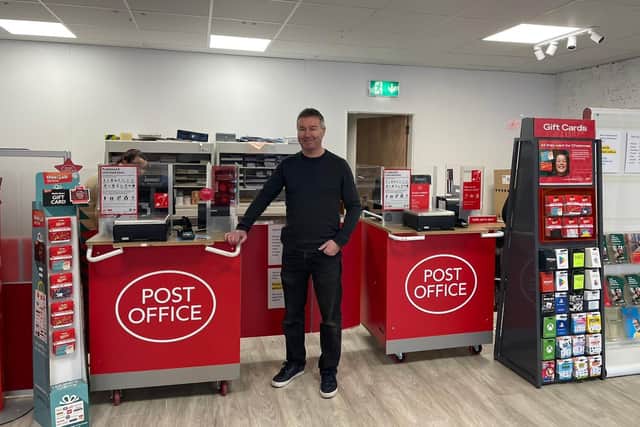 Downpatrick Post Office has opened at a new location to restore vital Christmas services after Storm Babet. Pictured is Gareth Latus inside the temporary shop at Unit 5a Grove Shopping Centre, Downpatrick