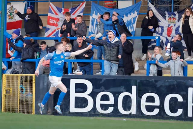 Glenavon fans enjoy the moment after Aaron Prendergast scores during this afternoon's game at Mourneview Park in Lurgan. PIC: Alan Weir/Pacemaker Press