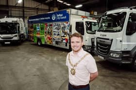 Lord Mayor of Belfast Councillor Ryan Murphy at Duncrue Complex alongside Council HGV vehicles that are now running on hydrotreated vegetable oil (HVO). HVO is a low-carbon, zero-sulphur fuel made from waste renewable materials like rapeseed and sunflower oil. Photo: Belfast City Council /PA Wire