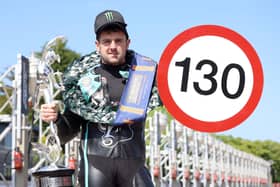 Michael Dunlop celerbates his 25th Isle of Man TT victory and the first 130mph TT lap on a Supersport machine after a record-breaking performance on Wednesday