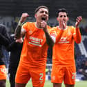 Rangers' James Tavernier (centre) and team-mates celebrate in front of the fans following victory in the William Hill Premiership match at Falkirk Stadium. (Photo by Andrew Milligan/PA Wire)