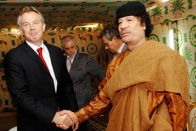 Former Prime Minister Tony Blair meeting Libyan leader Colonel Muammar Gaddafi at his desert base outside Sirte south of Tripoli in 2007. UUP Peer Lord Empey believes a deal done between the two men over nuclear weapons may explain why the UK is allegedly passive about securing compensation from Libya for IRA victims.