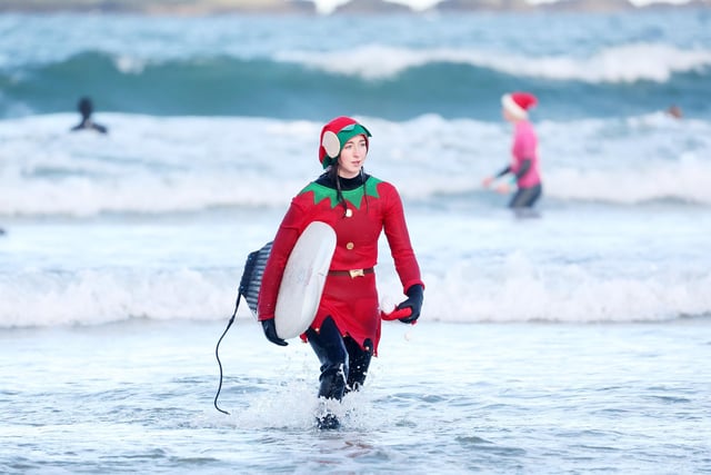 Press Eye - Belfast - Northern Ireland - 10th December 2022

Wave Project Santa Surf 2022 takes place at the east strand in Portrush, Co. Antrim.  Surfers took to the waves for the 4th annual Santa surf followed by raffles, hot drinks, mince pies and live music

Picture by Jonathan Porter/PressEye:The Wave Project Santa Surf 2022 takes place at the east strand in Portrush, Co. Antrim:The Wave Project Santa Surf