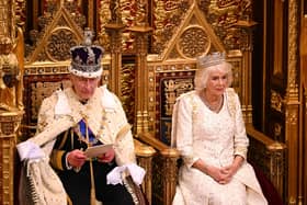 King Charles III delivers a speech beside Queen Camilla during the State Opening of Parliament in the House of Lords at the Palace of Westminster in London on Tuesday morning.  It was King Charles's first King's speech as monarch, having previously deputised for the late Queen to open parliamentary sessions. Photo: Leon Neal/PA Wire