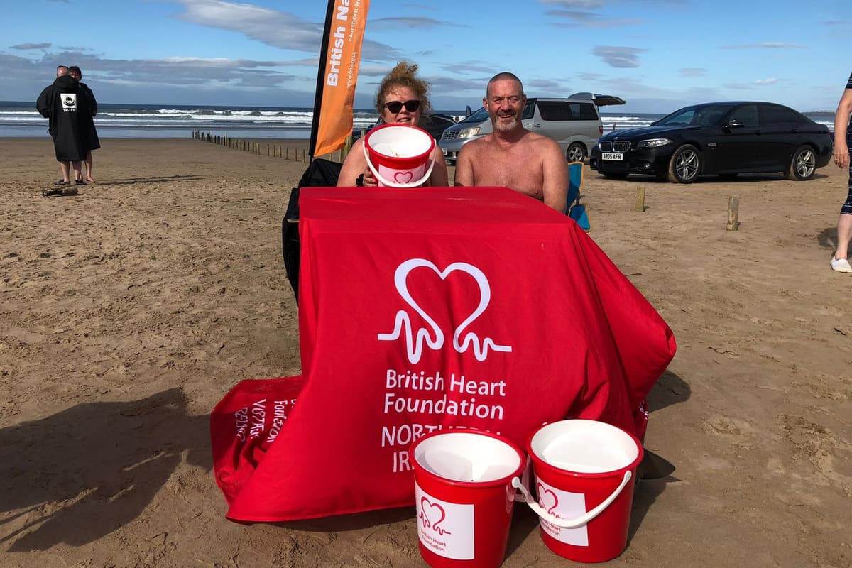 Video: Northern Ireland naturists are all heart as 50 of them strip-off for a charity skinny dip in Portstewart!