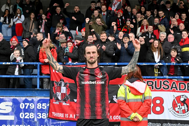 Declan Caddell takes the deserved plaudits from Crusaders fans at Mourneview Park