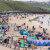 Crowds in Portrush enjoying the hottest day of the year in Northern Ireland on July 18. Photo by Jonathan Porter / Press Eye