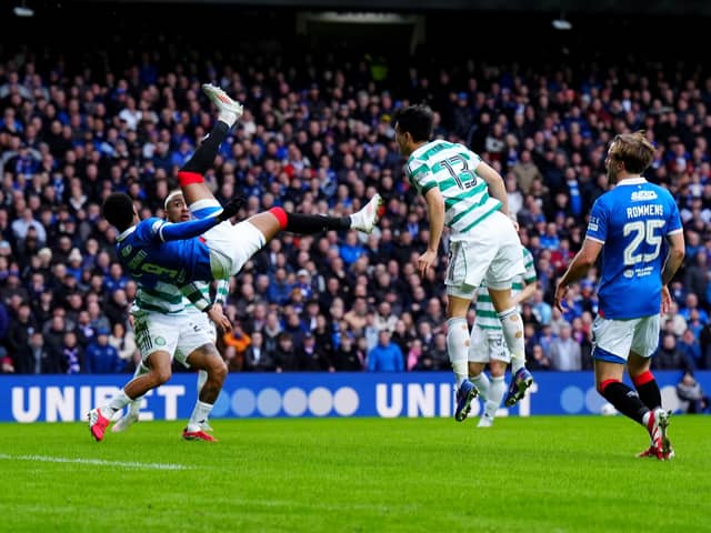Rangers' Youssef Chermiti (left) breaks the deadlock with an overhead kick at Ibrox against Celtic in the 2-2 draw. (Photo by Jane Barlow/PA Wire)