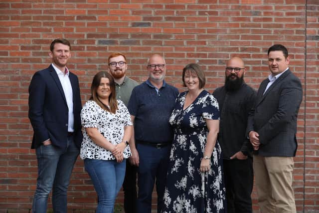 Holywood-based cloud solutions company 3EN is celebrating a strong end to 2023, boosting its overall sales by 10% compared to 2022. Pictured are Matthew McDowell, Laura Blacklock, Conor McDonnell, Dale Cree, Alison Cree, Adam Cree and Mark Bell from 3EN