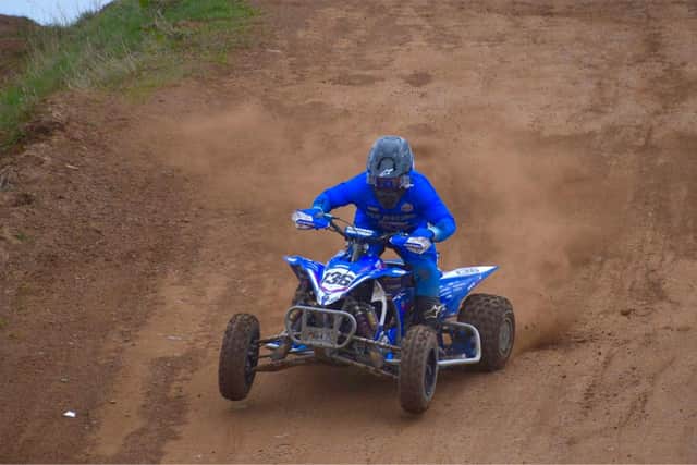 Moira’s Dean Dillon powering his way to his first British Quad championship win at Duns MX track