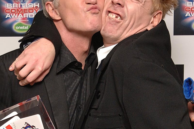 File photo dated 14/12/05 of Paul O'Grady (left) with the Best Comedy Entertainment Personality he received from John Lydon at the Bristish Comedy Awards 2005.