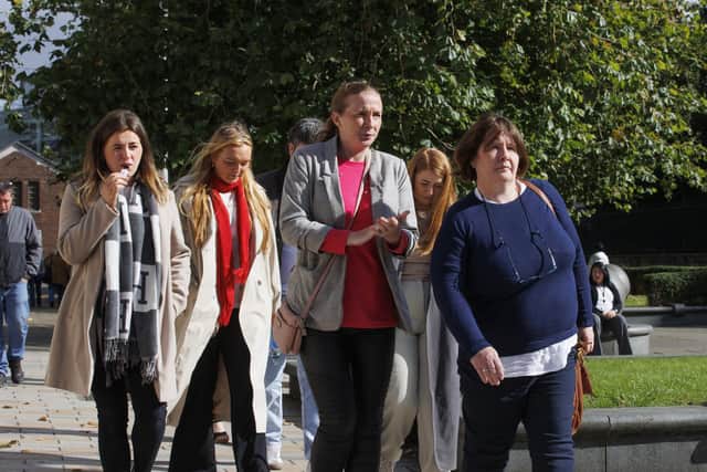 Katie Simpson's mother Noeleen Simpson (right) with family and friends leaving the Coroner's Court in Belfast after the pre-inquest review in the inquest into the death of Katie Simpson in 2020.   Picture date: Tuesday September 24, 2024. PA Photo.