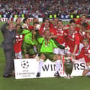 Manchester United celebrate after winning the 1999 European Cup with a dramatic victory over Bayern Munich in Barcelona. (Photo by John Peters/Manchester United via Getty Images)
