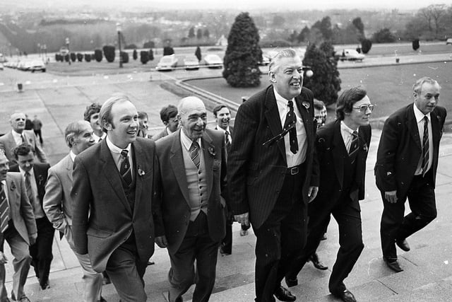 Pictured in November 1982 is a smiling Reverend Ian Paisley leading elected members into the Assembly at Stormont. Picture: News Letter archives