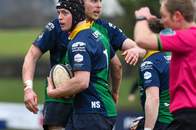 Ballynahinch's George Pringle celebrates scoring a try at Ballymacarn Park in a 28-15 win over Young Munster as the Ulster side moved within two points of the Division 1A playoffs. (Photo by Andrew McCarroll/Pacemaker Press)