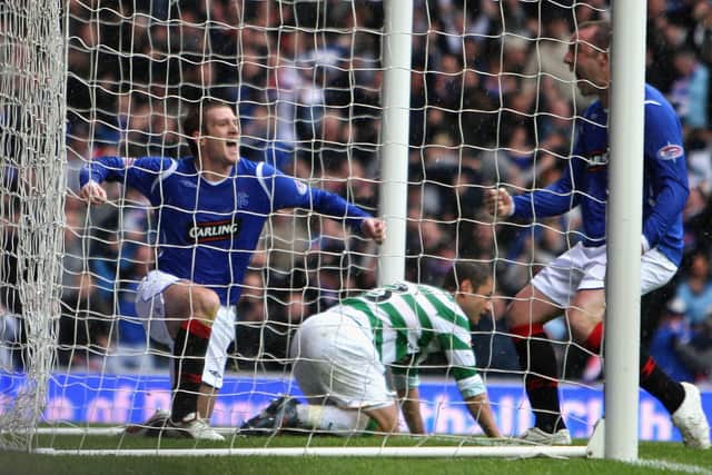 Steven Davis celebrates scoring for Rangers against Celtic in the Scottish Premier League in 2009