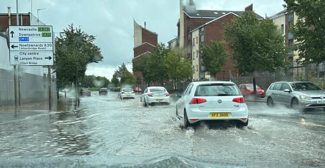 Flash floods in east Belfast on the Short Strand, beside apartments on the right that overlook the River Lagan, on Sunday afternoon August 6 2023, as thunder storms swept across Northern Ireland. Photo David McCormick/Pacemaker Press