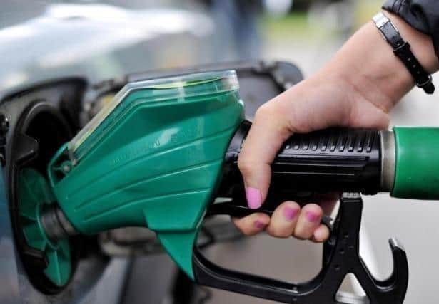 The NI Consumer Council has been praised in the House of Commons for helping keep forecourt prices down.