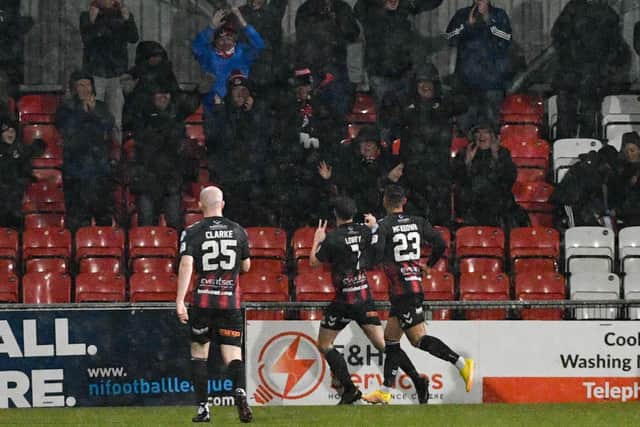 Crusaders midfielder Philip Lowry celebrates after netting his 20th goal of the season against Coleraine on Friday night.