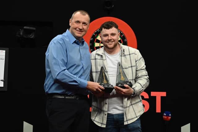 Josh Rock pictured with Wayne Mardle after receiving the PDC Best Newcomer and Youth Player of the Year awards.