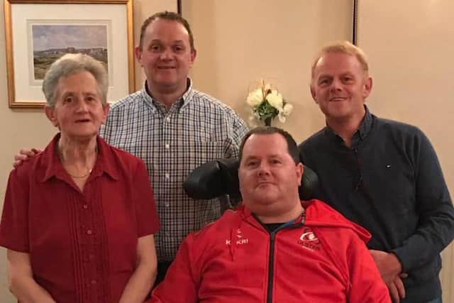 From left, Betty McCallen with her sons Phillip, Ronnie and Noel.