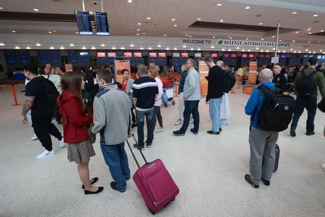 Passengers at Belfast International Airport as flights to the UK and Ireland have been cancelled as a result of air traffic control issues in the UK. Pic: Liam McBurney/PA Wire