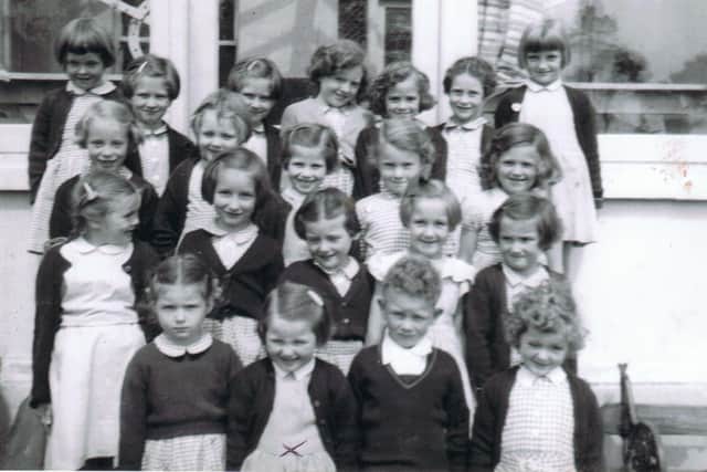 A cherubic Jenny at Kindergarten at Coleraine High School - can you spot her? Bristow is second from the left in the first row