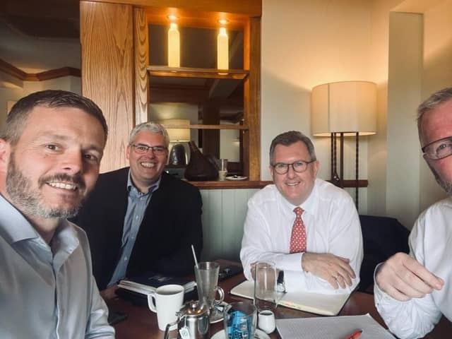 A selfie of Robbie Butler, UUP MLA, Gavin Robinson, DUP MP, Sir Jeffrey Donaldson MP, DUP leader, and UUP leader Doug Beattie MLA enjoying coffee.
