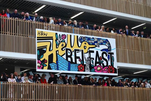 The audience gather on balconies to listen to US President Joe Biden deliver his keynote speech at Ulster University in Belfast, during his visit to the island of Ireland. Picture date: Wednesday April 12, 2023.