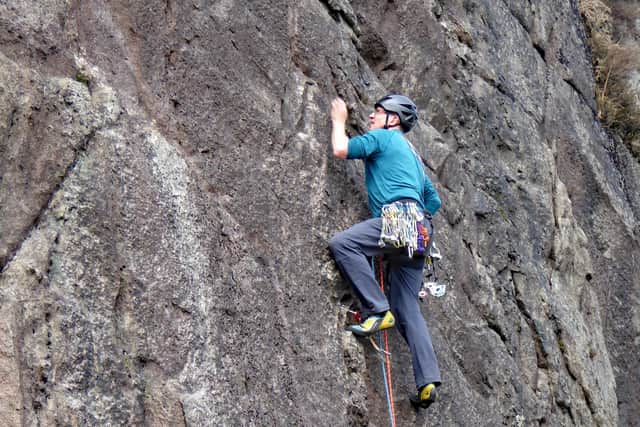 Dawson Stelfox rock climbing in the Mournes before his stroke