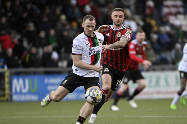 Glentoran midfielder Seanan Clucas (left) is eyeing a strong end to the season after returning from injury