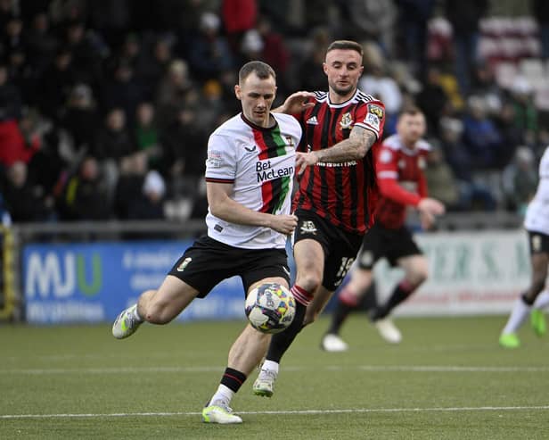 Glentoran midfielder Seanan Clucas (left) is eyeing a strong end to the season after returning from injury