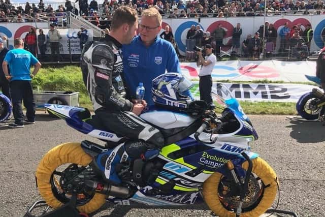 Dwayne McCracken with Magherafelt rider Paul Jordan on the grid at the Ulster Grand Prix in 2017.