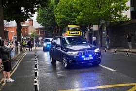 Vehicles arriving at the Criminal Courts of Justice in Dublin, where Daniel Kinahan is expected to appear charged with directing an organised crime group, after being extradited from Dubai. Picture date: Sunday August 9, 2026.
