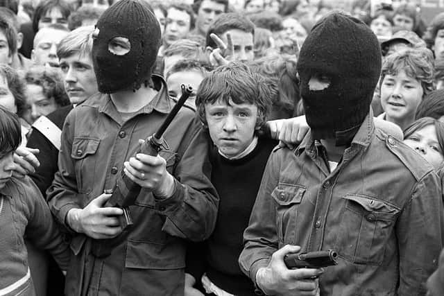 IRA gunmen on the Falls Road in 1980. Victims of the Northern Ireland Troubles have accused the UK Government of abandoning them, after its controversial Legacy Bill passed its final hurdle at Westminster. Photo: Pacemaker.