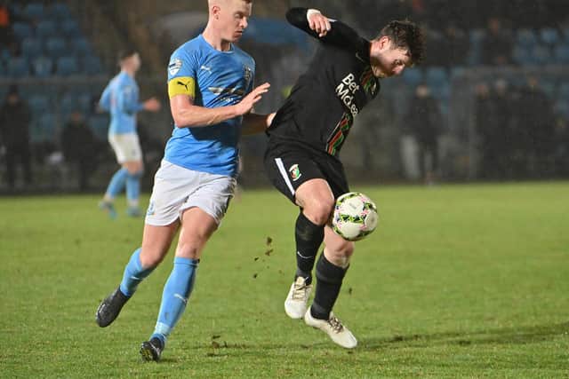 Josh Kelly (left) will work under Warren Feeney for the second time in his career after joining Glentoran from Ballymena United