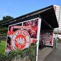 Pacemaker Press 30-08-2024: Larne have made history by becoming the first Irish League club ever to make the group or league stages of a European club competition as an Andy Ryan hat-trick saw them defeat Lincoln Red Imps 4-3 on aggregate in the Uefa Conference League play-off. Pictured: a bus stop in the town on Friday. Picture By: Arthur Allison/Pacemaker Press.