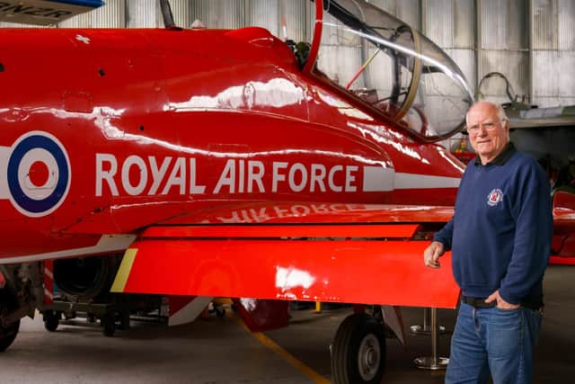 Ray Burrows, chairman of the Ulster Aviation Society in front of a former RAF Red Arrows jet at their hangar at the old Maze prison site. Photo: Sarah Harkness/Pacemaker Press