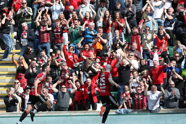 Crusaders fans celebrate after Adam Lecky doubled their advantage