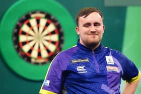 Luke Littler celebrates victory in the semi-final against Rob Cross on day 15 of the Paddy Power World Darts Championship at Alexandra Palace, London. (Photo by Zac Goodwin/PA Wire)